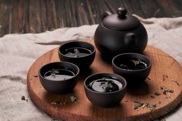 Tea set on a wooden kitchen board