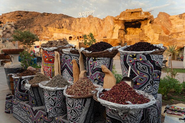 Tea and spices in bags at the orient market in the evening