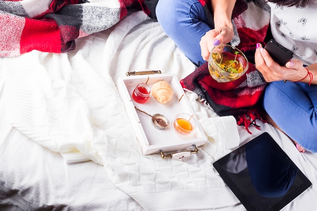 Tea in tray with woman