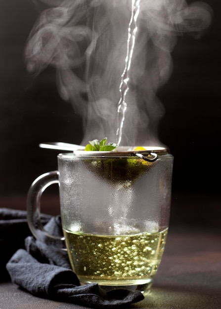 Tea winter drink with hot steam