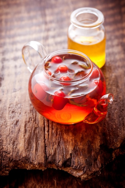 Tea with honey and rosehip Vertical