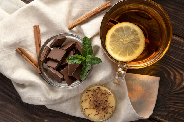 Tea with lemon, honey and chocolate