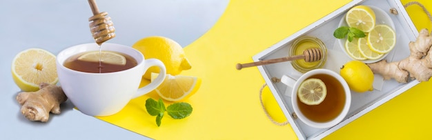 회색 및 노란색 배경의 흰색 컵에 레몬 꿀과 생강을 넣은 차