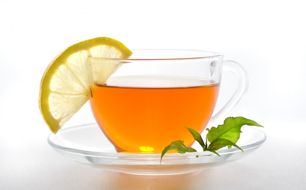 Tea with lemon on a white background