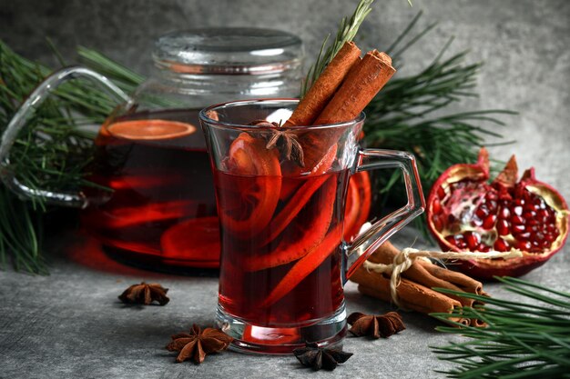 Tea with Oranges and cinnamon sticks