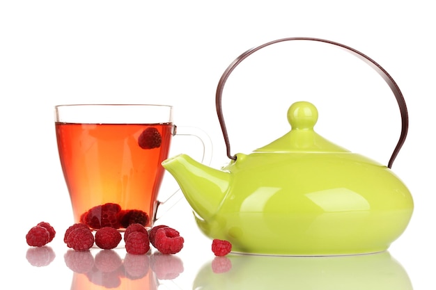 Tea with raspberries isolated on white