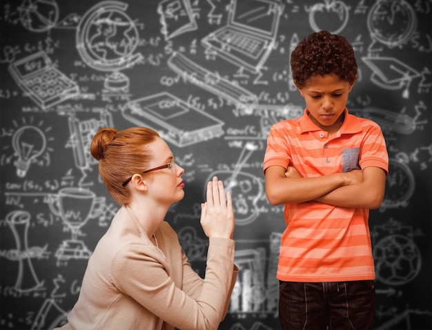 Photo teacher begging boy against black background