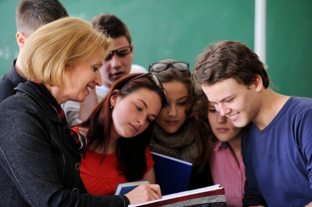 Teacher showing a book