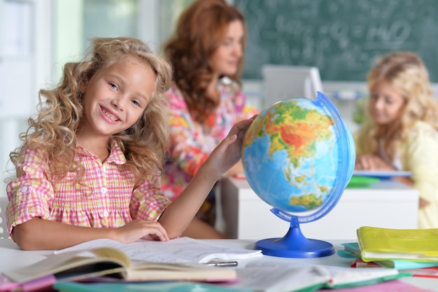 Teacher with two girls at lesson