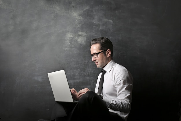 Teacher working on a laptop