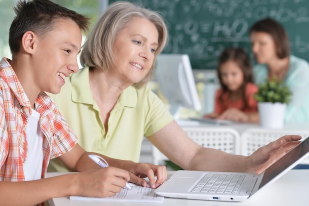 Teachers working with pupils