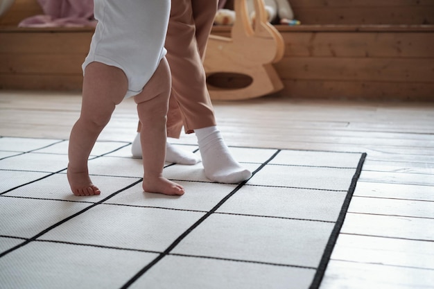 Photo teaching baby to walk