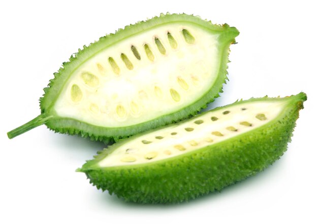 Teael gourd over white background