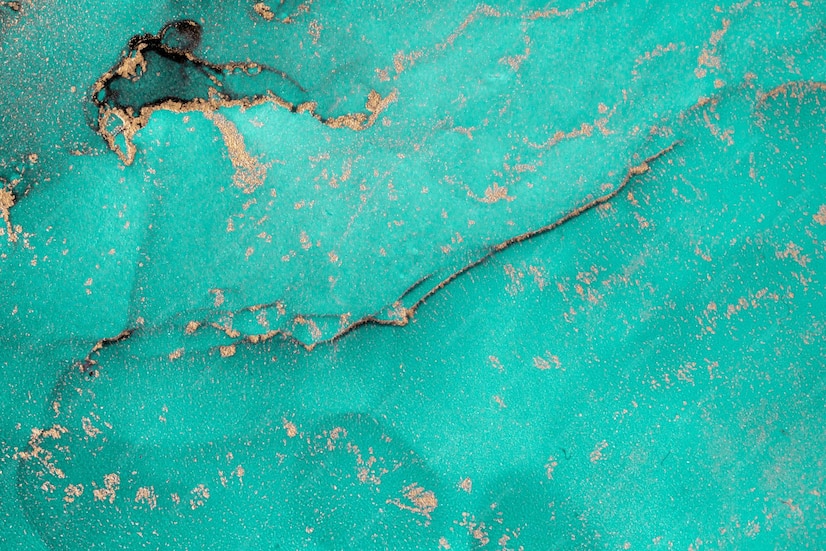 Premium Photo | Teal and gold marble wallpaper that is a turquoise