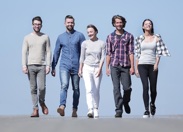 Team of confident friends go ahead