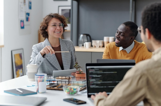 Team of developers working together at office