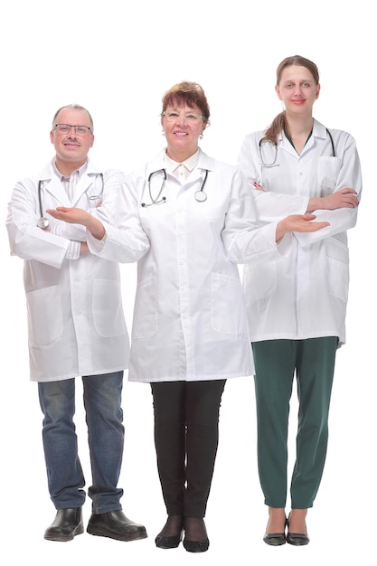 Team of doctors standing arms crossed and smiling at camera. Concept of medical help and confidence