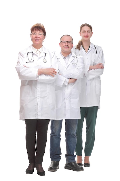 Team of doctors standing arms crossed and smiling at camera