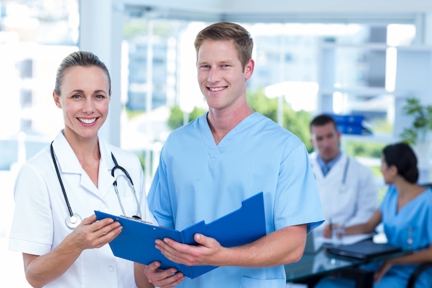 Team of doctors working on their files