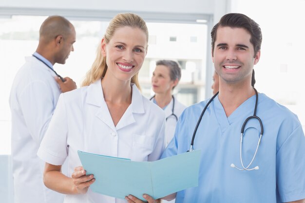 Team of doctors working on their files