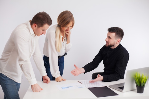 Team of employees working together on joint project