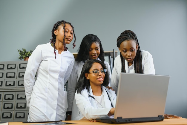 Team Of Experts Doctors Examining Medical Exams