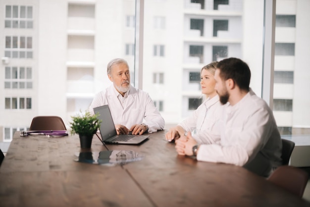 Team of experts doctors meeting in conference room