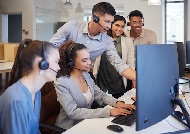 Team mentor and call centre with headphone computer or office as agent training support or collaboration as customer service People coaching or telemarketing for client help as sales consultant