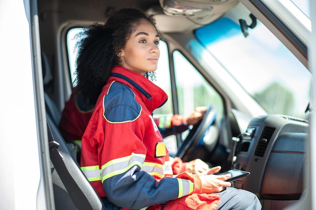 Team of paramedics in the ambulance car