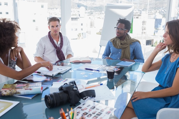 Photo team of photo editors brainstorming