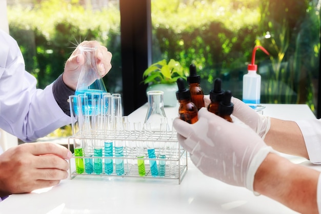 Photo team of researcher or scientists working in laboratory