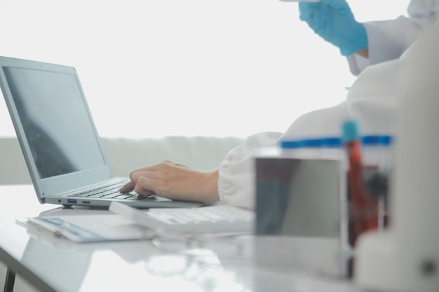 Photo team of scientists choose between printed circuit board to work with in the background technologically advanced scientific research center