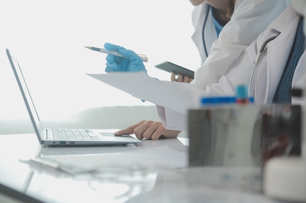 Team of Scientists Choose Between Printed Circuit Board to Work With In The Background Technologically Advanced Scientific Research Center