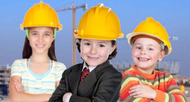 Team of small workers on the construction site