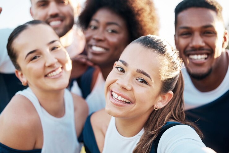 Photo team sport and selfie with diversity happy and smile from workout outdoor for training teamwork wellness and healthy friends portrait with young people and fitness community together in a park