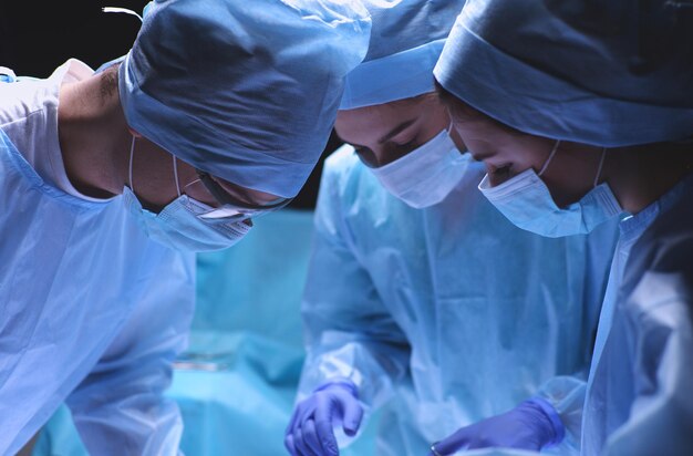 Team surgeon at work in operating
