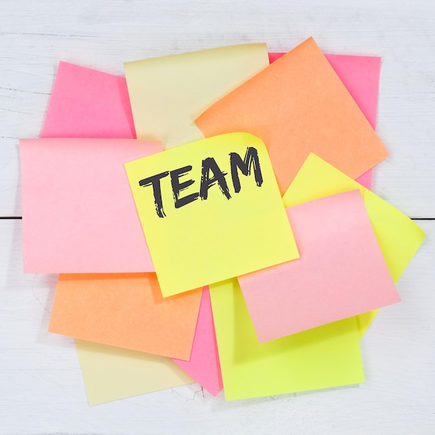 Team teamwork working together business concept desk note
paper