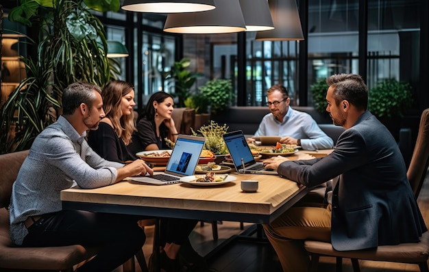 A team working together on laptops in a collaborative workspace