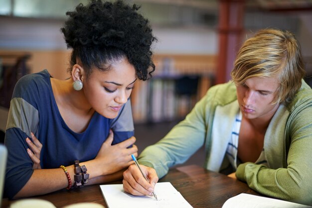 Photo teamwork education or students writing in notes studying for exam or learning in classroom university diversity or people in school library for knowledge academic course or research in college