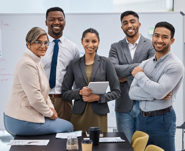 teamwork is what allows us to succeed portrait of a group of businesspeople working together in an office