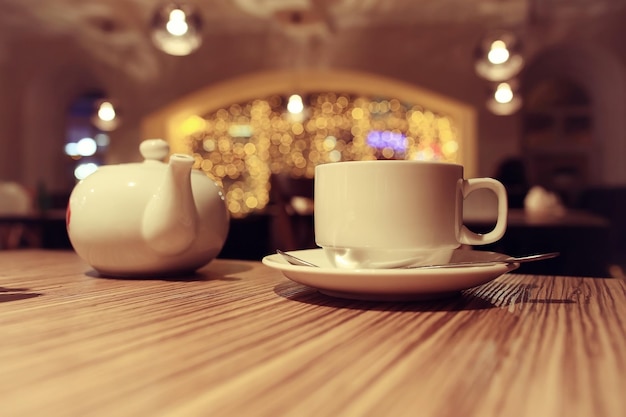 teapot and cup of tea at a cafe