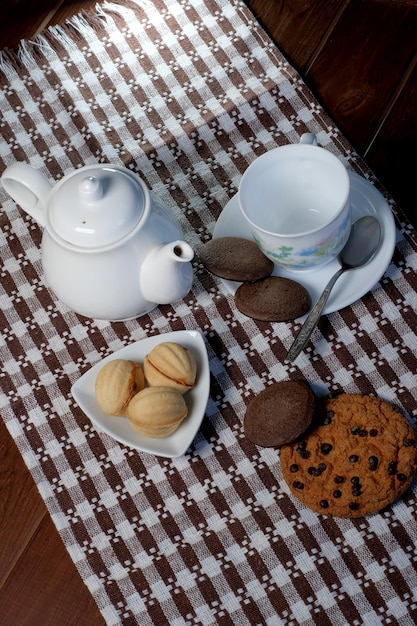 Teapot with a cup