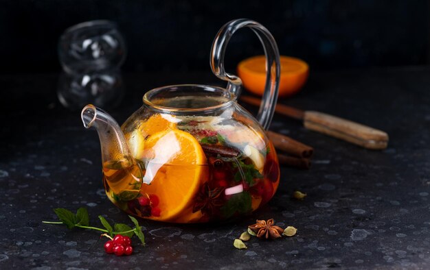 A teapot with fruit tea