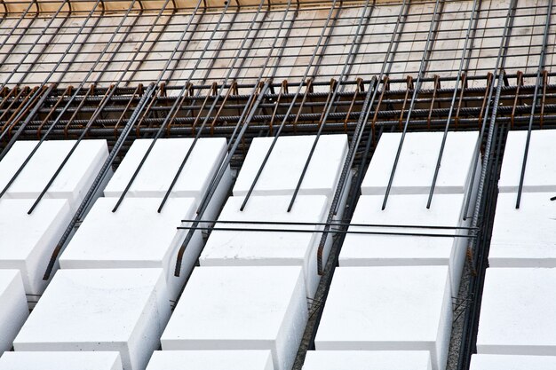 Technical detail of building operations: floor. Materials: polystyrene, steel bars, concrete