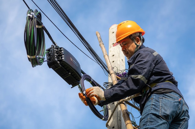 Technician are checking fiber optic cable for maintenance