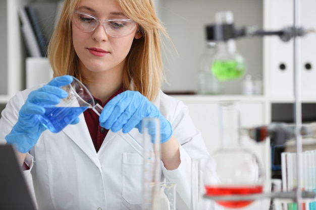 Technician hold in arms in protective gloves