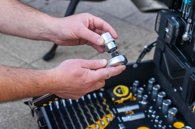 A technician man inspecting the case with the instruments