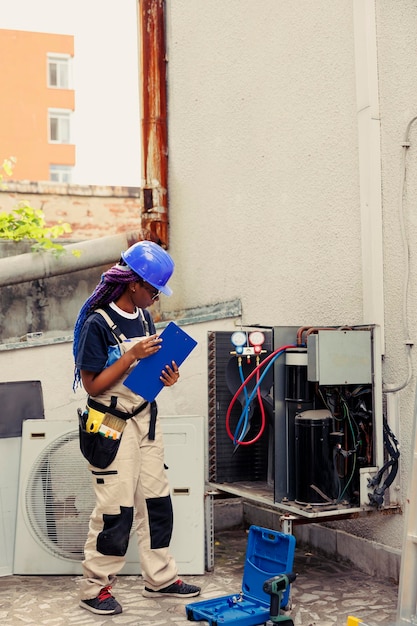 Technician optimizing HVAC system