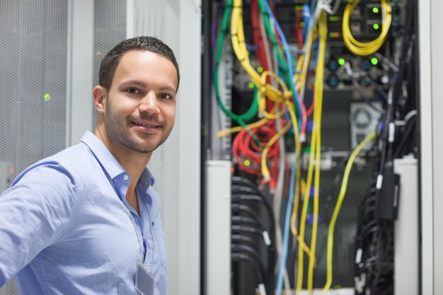 Technician sanding next to the data sore