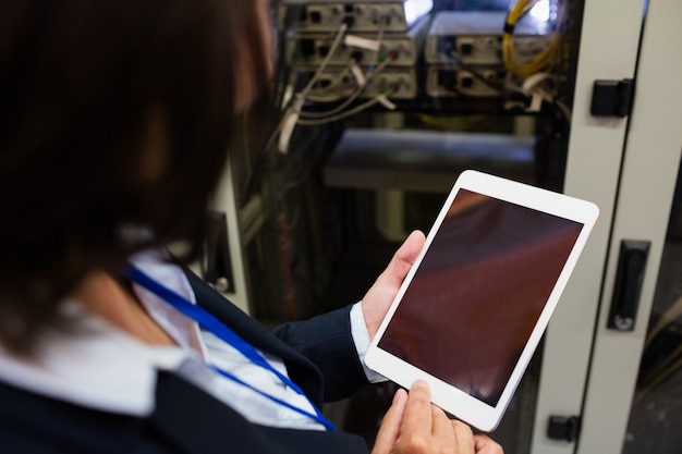 Technician using digital tablet